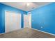 Bedroom with carpeting, a large closet, and a window offering natural light at 264 Milestone Dr, Haines City, FL 33844
