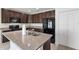 Modern kitchen with stainless appliances, granite countertops, and ample cabinet space at 264 Milestone Dr, Haines City, FL 33844