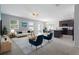 Open-concept living room with modern decor, filled with natural light and inviting ambiance at 264 Milestone Dr, Haines City, FL 33844