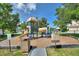Community playground with slides, climbing structures, and safety surfacing for endless fun and recreation at 264 Milestone Dr, Haines City, FL 33844