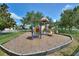 Community playground with slides, climbing structures, and safety surfacing for endless fun and recreation at 264 Milestone Dr, Haines City, FL 33844