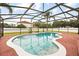 Inviting screened-in pool offering a private outdoor retreat for relaxation and recreation at 2725 White Magnolia Loop, Clermont, FL 34711