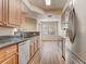 Well-lit kitchen featuring granite countertops and stainless steel appliances at 2763 Metro Sevilla Dr # 103, Orlando, FL 32835