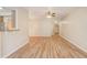 Spacious open floor plan with modern hard surface flooring throughout living areas at 2763 Metro Sevilla Dr # 103, Orlando, FL 32835