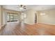 Spacious and inviting living room featuring an open layout, neutral tones, and sliding glass doors to the outdoor patio at 2763 Metro Sevilla Dr # 103, Orlando, FL 32835