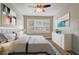 Comfortable main bedroom with natural light, ample space, and neutral decor for relaxation at 2763 Metro Sevilla Dr # 103, Orlando, FL 32835