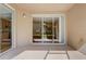 Private patio with sliding glass doors to kitchen and living areas at 2763 Metro Sevilla Dr # 103, Orlando, FL 32835