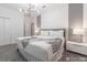 Neutral bedroom with modern lighting, and accent wall at 2816 Simile St, Kissimmee, FL 34746