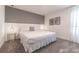 Bright primary bedroom featuring modern lighting and neutral decor at 2816 Simile St, Kissimmee, FL 34746