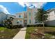 Charming two-story home boasting modern architectural design, manicured landscaping, and a welcoming entrance at 2816 Simile St, Kissimmee, FL 34746