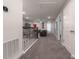 Upstairs hallway featuring carpet and a sitting area at 2816 Simile St, Kissimmee, FL 34746