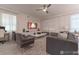 Bright living room featuring modern decor and sleek, contemporary furnishings at 2816 Simile St, Kissimmee, FL 34746