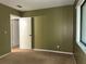 A simple bedroom with a neutral color scheme offers a calming, comfortable space at 304 Spring Run Cir, Longwood, FL 32779