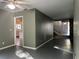 A spacious living room features an open floor plan and entry foyer with stone accent wall at 304 Spring Run Cir, Longwood, FL 32779