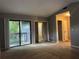 Bright bedroom features a private balcony, and ensuite bathroom with ample closet space at 304 Spring Run Cir, Longwood, FL 32779