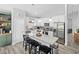 Modern kitchen with granite counters, stainless steel appliances, and a large island at 38 Jett Loop, Apopka, FL 32712