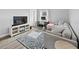 Comfortable living area with contemporary furnishings, wood flooring, and an eye-catching floral rug at 38 Jett Loop, Apopka, FL 32712
