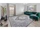 Open living room with new floors, large windows, and stylish furnishings at 38 Jett Loop, Apopka, FL 32712