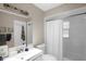 Modern bathroom with a shower-tub combination and well lit vanity at 4217 Ilene Ct, Orlando, FL 32806