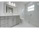 This bathroom features a large shower and a modern vanity at 4266 La Salle Ave, St Cloud, FL 34772