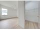 This bedroom view highlights the closet and light wood-look floors at 4266 La Salle Ave, St Cloud, FL 34772