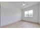 This light and bright bedroom has a window and light wood-look floors at 4266 La Salle Ave, St Cloud, FL 34772
