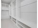A large walk-in closet with custom shelving and storage at 4266 La Salle Ave, St Cloud, FL 34772