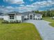 Stunning single-story home with manicured lawn and elegant stone accents at 4266 La Salle Ave, St Cloud, FL 34772