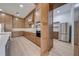 Beautiful kitchen featuring wooden cabinets, modern appliances, and a convenient walk-in pantry at 4266 La Salle Ave, St Cloud, FL 34772