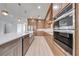 Gourmet kitchen showcasing stainless steel appliances and custom cabinetry at 4266 La Salle Ave, St Cloud, FL 34772