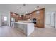 Spacious kitchen with stainless steel appliances, modern lighting, and a center island at 4266 La Salle Ave, St Cloud, FL 34772