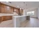 Modern kitchen features stainless steel appliances and a large center island at 4266 La Salle Ave, St Cloud, FL 34772