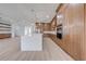 Spacious kitchen with large island, custom wood cabinets, built-in oven and modern appliances at 4266 La Salle Ave, St Cloud, FL 34772