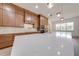 Modern kitchen featuring quartz countertops, a stylish backsplash, and pendant lighting at 4266 La Salle Ave, St Cloud, FL 34772