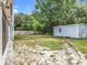 Large backyard with a storage shed and a wooden fence at 4274 Meeting Pl, Sanford, FL 32773
