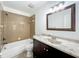 Well lit bathroom featuring a vanity with a mirror, and a shower/tub combo at 4274 Meeting Pl, Sanford, FL 32773