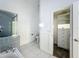 Bathroom featuring soaking tub, walk-in shower, and closet at 4274 Meeting Pl, Sanford, FL 32773