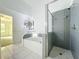 Bathroom featuring soaking tub, walk-in shower, and modern fixtures at 4274 Meeting Pl, Sanford, FL 32773