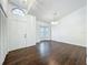 Living room featuring hardwood floors, modern lighting, neutral color palette, and plenty of natural light at 4274 Meeting Pl, Sanford, FL 32773