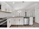 Updated kitchen featuring stainless steel appliances, granite countertops and abundant storage space at 4398 Fox Hollow Cir, Casselberry, FL 32707