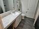 Bathroom featuring a vanity with storage, modern fixtures, and tile flooring for a clean and sleek look at 4564 Orchard Grove Rd, St Cloud, FL 34772