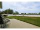 Expansive backyard featuring a well-maintained lawn and full perimeter fence at 6011 Country Walk Ln, Winter Haven, FL 33880