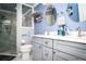 Bathroom featuring a walk-in shower, vanity with double mirrors and ample storage at 6011 Country Walk Ln, Winter Haven, FL 33880