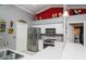 Charming kitchen featuring stainless steel appliances and decorative accents at 6011 Country Walk Ln, Winter Haven, FL 33880