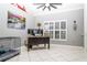 Bright office space with large windows, plantation shutters, and a work desk at 6011 Country Walk Ln, Winter Haven, FL 33880