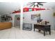 Bright office and living area with a modern desk, comfortable seating, and stylish decor accents at 6011 Country Walk Ln, Winter Haven, FL 33880