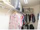 Organized walk-in closet with ample storage space for clothing and accessories at 6011 Country Walk Ln, Winter Haven, FL 33880