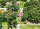 A tranquil home site is surrounded by mature landscaping and trees in a quiet neighborhood at 6301 Parson Brown Dr, Orlando, FL 32819