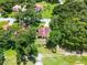 A tranquil home site is surrounded by mature landscaping and trees in a quiet neighborhood at 6301 Parson Brown Dr, Orlando, FL 32819