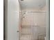 Tiled shower with glass door and showerhead in bathroom at 6301 Parson Brown Dr, Orlando, FL 32819